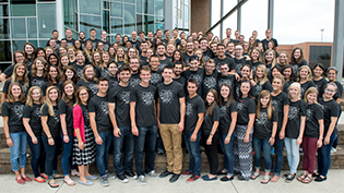 Ministries-Discipleship-Ministries A group of Discipleship leaders stands on the BTS steps